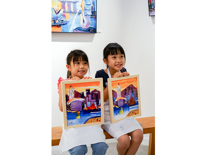 Children in Hong Kong with art by Anna Salenko