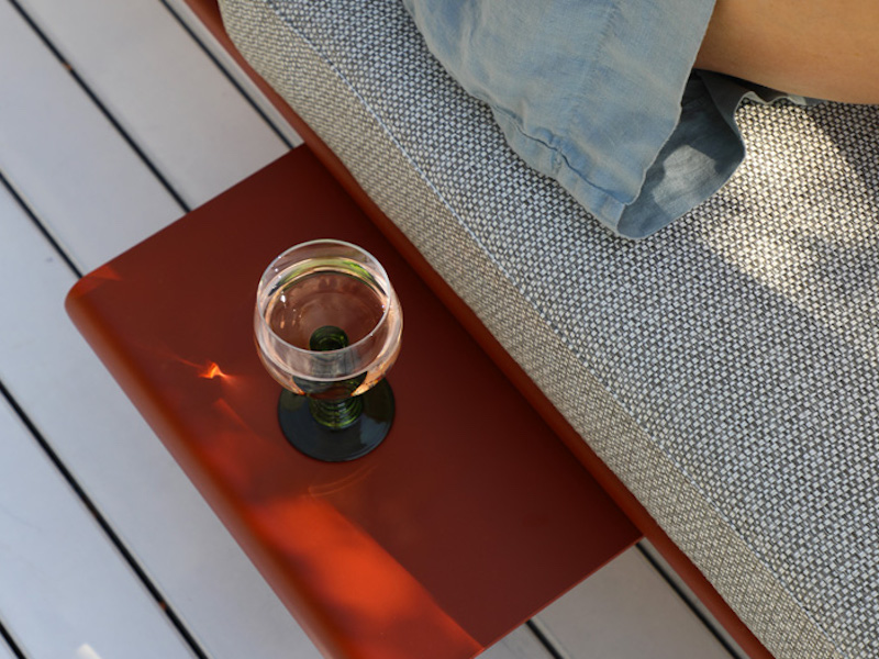 Outdoor lounge chair with drink rest by SunWeave