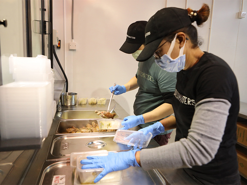 Hong Kong charity The Kind Kitchen - staff preparing meals